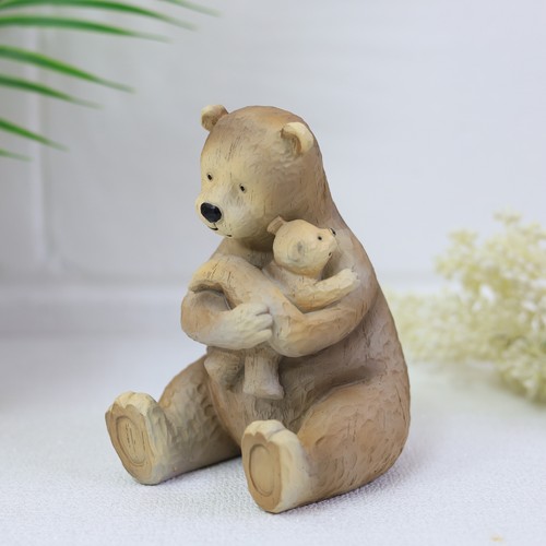 Bear cub hugging animal - hugging,
