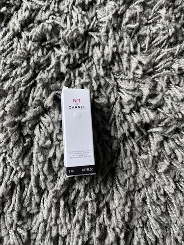 Chanel red camellia - de,