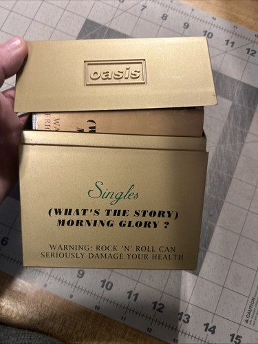 Rare oasis singles what the - rare,