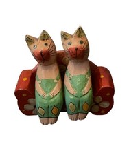 hand-carved and hand-painted wooden cat figurine. On Sofa Ornament