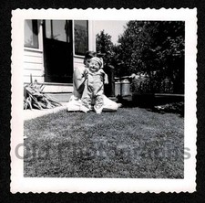 HIIDEN MOTHER BEHIND HOLDING