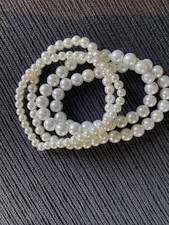 Set Of Four Costume Stretch Bracelets Pearl Style