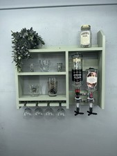 Wall mounted optics bar