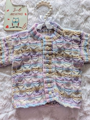 New hand knitted baby - hand,