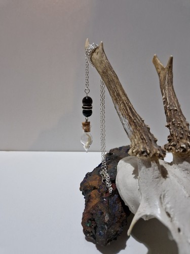 Rabbit teeth obsidian - teeth,