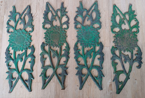 Four 1930s cast - iron, sunflower