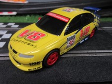 SCALEXTRIC C2625 Holden commodore V8 supercar RUNS OK , FOR SPARES OR REPAIR.