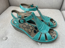 Fly London Leather Low Wedge T