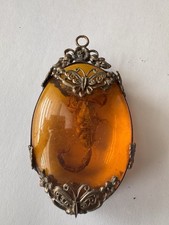 Amber stone pendent with - stone, a
