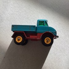 Matchbox  UNIMOG TRUCK. Blue/red NO.49.  Fully intact But Playworn.