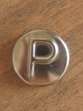 Prestige metal badge for