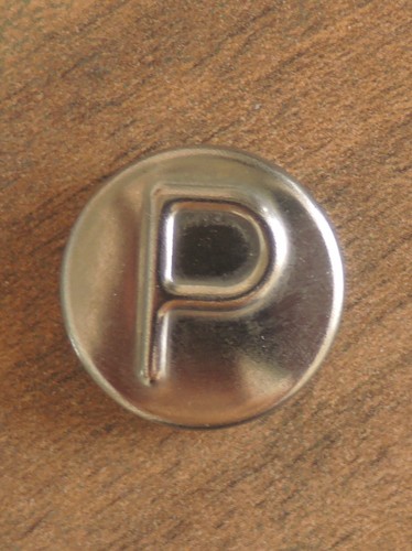 Prestige metal badge for