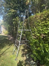 Henchman senior platform ladder with extending legs.