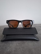 Peter and May sunglasses black frame whisky brown lens. Excellent condition