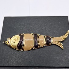 articulated fish pendant