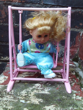 girl on a swing doll unknown