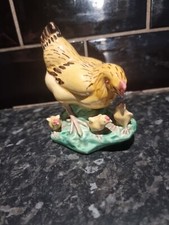 Vintage Collectors ceramic chicken with Baby chicks Figurine