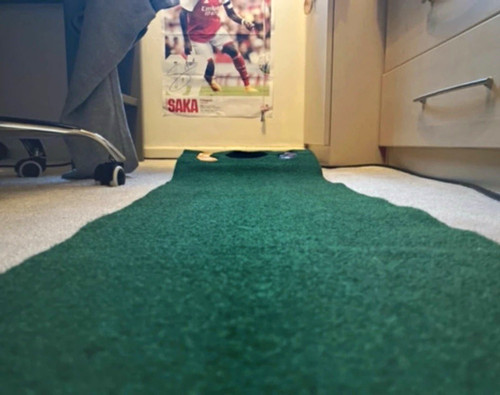 Green indoor golf putting - green,