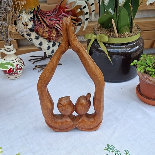Hand carved brown wood men - hand,