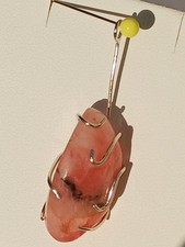 Tugtupite Pendant. Polished