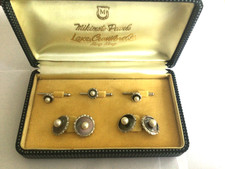 mikimoto pearls set in mop &