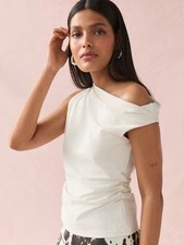 BNWT LADIES cream, party next top. Asymmetrical top. Size 8.Regular.This season.