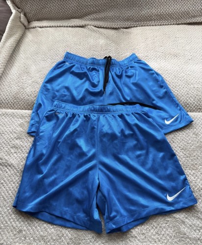 Worn gym shorts - worn, shorts.