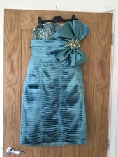 Cocktail  Dress size 8 Stunning turquoise  sequinned corset style bust  Terani