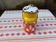 Old enamel milk can with multi