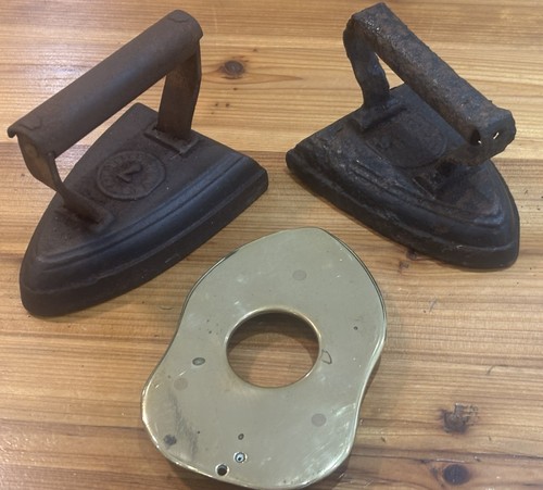 Pair antique cast - of, flat