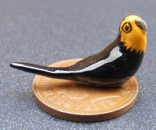 Black And Yellow Ceramic Bird