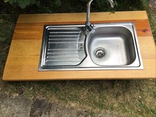 Stainless Steel Sink and Drainer on Wooden Worktop
