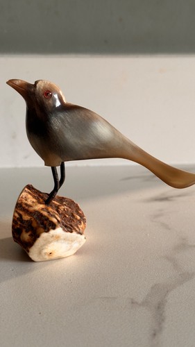 Vintage bird made - from, horn