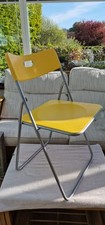 Two Yellow Ikea Folding Chairs