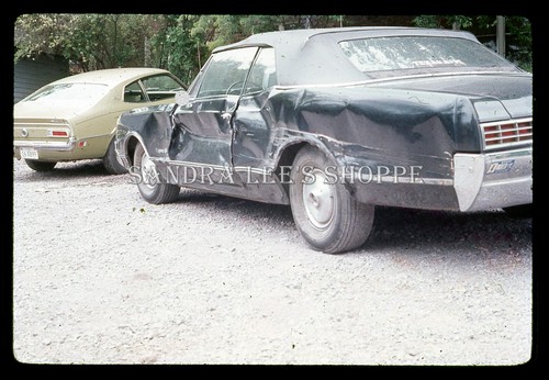1973 slide crushed oldsmobile - slide,
