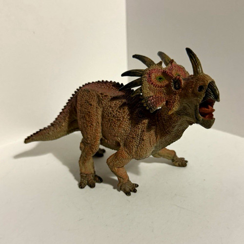 Horned ceratopsian dinosaur - horned,