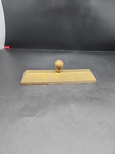 Antique brass newspaper vendor - brass,