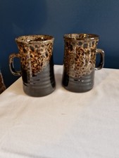 Pair Of Brown Fosters Pottery