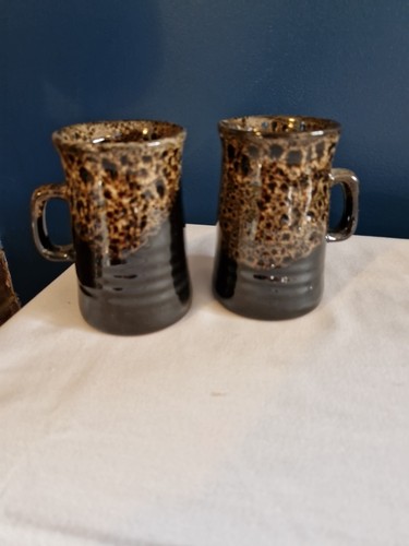 Pair brown fosters pottery - of,