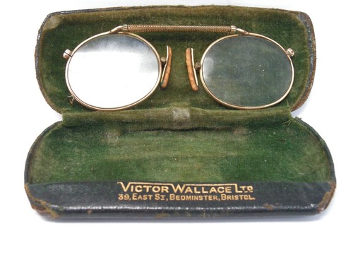 Antique gold metal victor - antique,