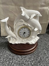 The Dancing Dolphins Clock