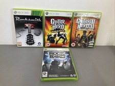 Xbox 360 + 4 Guitar Hero World