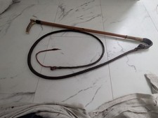 antique mens hunting whip. 