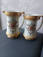 Two Vintage Water Jugs