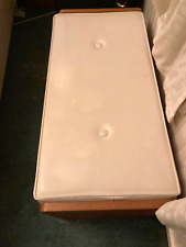 Ottoman blanket box with castors.