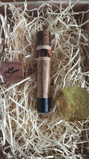 A unique pipe tobacco tamper -