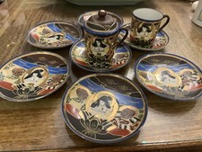 Hand painted Vintage Japanese Satsuma Ware. 7 Saucers, 2 Cups, 1 Lid. 1920’s