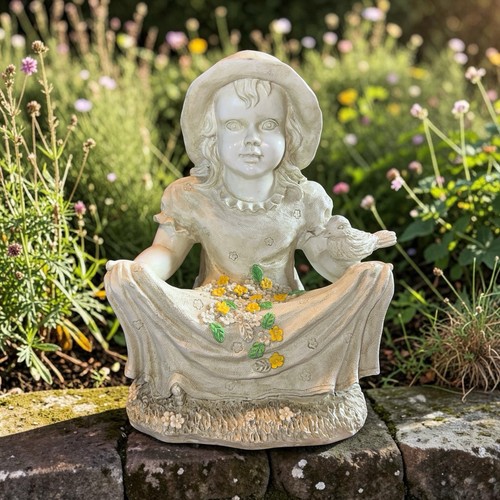 Girl with bird garden statue - with,