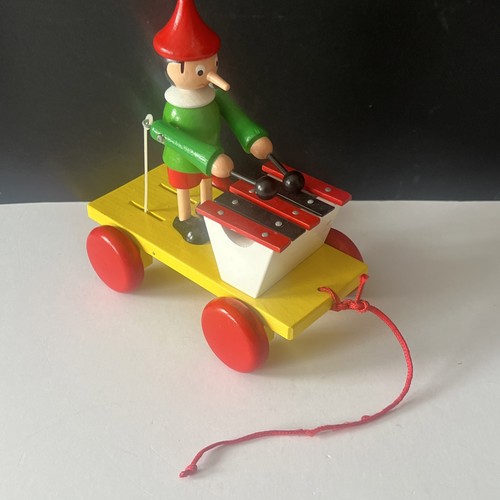 Vintage pull along wooden toy - along,