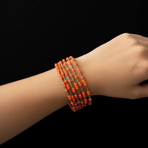 Orange bead coil bracelet - orange,